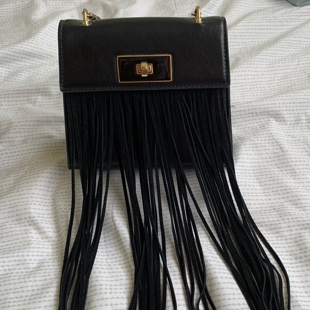 Black crossbody gold chain bag with fringe